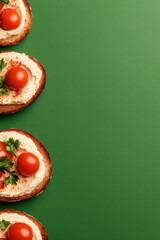 Freshly prepared open sandwiches with cherry tomatoes and herbs