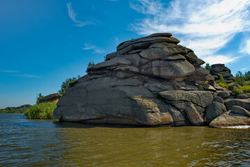 Russia. Altai Territory. Picturesque shores of Lake Kolyvan is surrounded by bizarre rocky outcrops...
