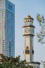 Old Meets New: Batumi Clock Tower and Modern Skyscraper