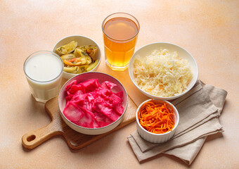 Fermented vegetables such as sauerkraut, pickled tomatoes, carrots, kimchi are displayed alongside...
