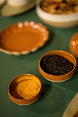 Close up on luxury italian tableware, dishes and glasses.