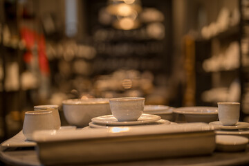 Close up on luxury italian tableware, dishes and glasses.