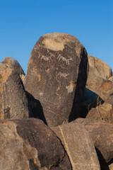 Ancient petroglyphs, hundreds or thousands of years old, in the desert of Arizona.