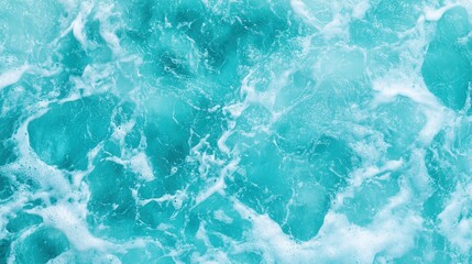 Obraz premium Turquoise waves gently kiss the sandy shore, embodying the serene essence of summer.