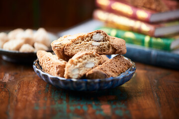 Cantuccini (Italian cookies) on dark wooden background. Close up