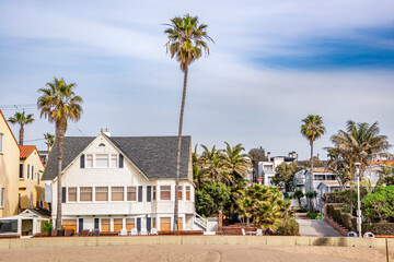 Hermosa and Manhattan Beach beach front properties and real estate with surrounding coastal features 