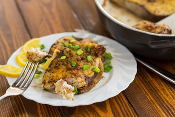 Baked fish with lemon and herbs
