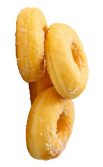 Side view of brown sugar glazed cinnamon donuts in stack isolated with clipping path in png file format