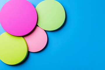 Light blue, pink, and green pastel background with paper cut shapes, flat lay, simple composition, high resolution, no blur effect, soft lighting, minimalist style, geometric shapes, light color