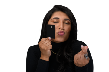 Woman blowing kiss and holding black credit card