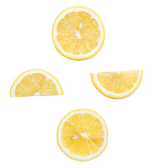 Fototapeta premium Top view set of fresh ripe yellow lemon fruits in halves and slices or quarters isolated with clipping path in png file format