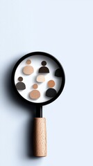 Magnifying glass focusing on diverse human figures symbolizing research and analysis.
