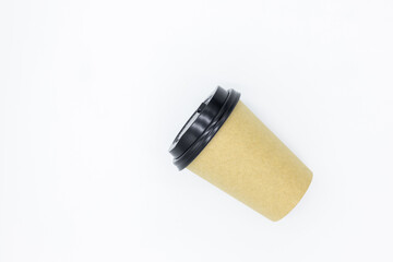 Brown paper coffee cup with black lid on white background, Brown paper cup blank coffee cup for takeaway on white background, Brown empty paper cup for coffee eco coffee cafe.