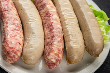 sausages raw meat pork, beef, chicken, lamb fresh tasty food dish gourmet food background on the...