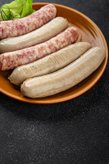 sausages raw meat pork, beef, chicken, lamb fresh tasty food dish gourmet food background on the table rustic food top view copy space