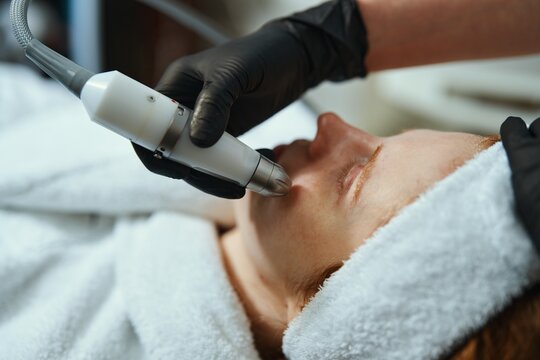 Skin treatment procedure at a wellness center for facial rejuvenation