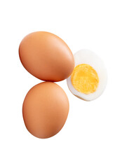 Top view set of two raw chicken eggs and cooked or boiled egg with egg yolk in one half isolated with clipping path in png file format