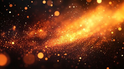 Fototapeta premium Abstract fiery orange and gold glitter bokeh background.