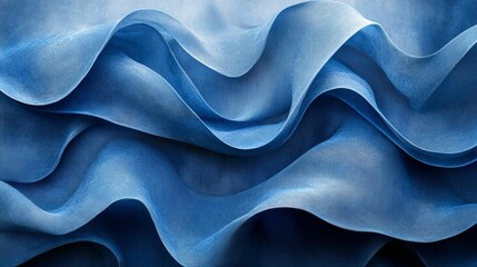 Obraz premium Abstract image of flowing blue fabric with wave-like patterns and subtle color variations.