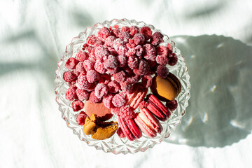 French fruity macaroons in red and pink.