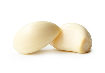 Side view of peeled garlic cloves or pieces in stack isolated on white background with clipping path