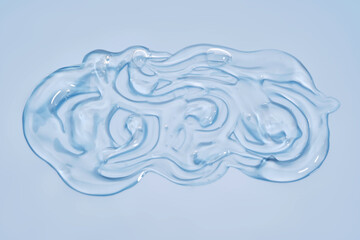 The texture of the cosmetic gel on the blue background.