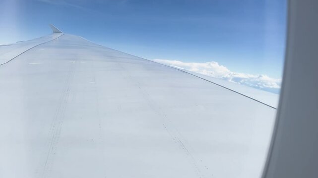 Wing and clouds through window Airbus A380 