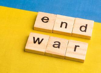 the words end of the war against the background of the Ukrainian flag