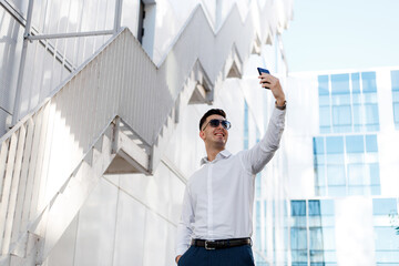 Man Taking Selfie With Cell Phone