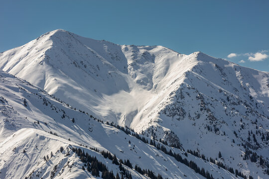 snow covered mountains in winter - Powered by Adobe