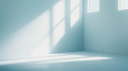 Fototapeta premium Sunlight Streaming Through Windows Illuminates a Minimalist Room With a Calming Blue Ambiance During the Morning Hours