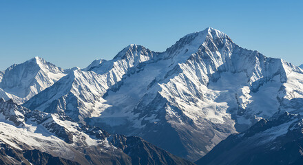 Obraz premium Snow-Capped Mountain Peaks Under Clear Sky