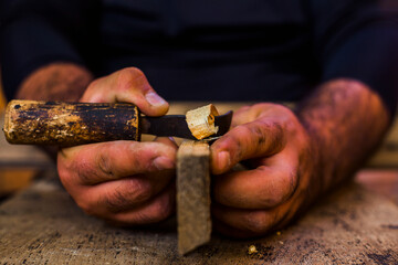 The carpenters are using spokeshave to decorate the woodwork.