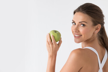 woman with apple on white background
