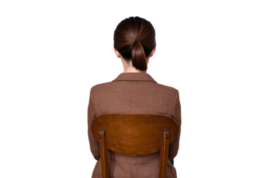 Woman seated on a chair with brown blazer, cut out - Powered by Adobe