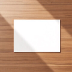 Mockup of a Blank White Rectangular Paper on a Light Brown Wooden Surface