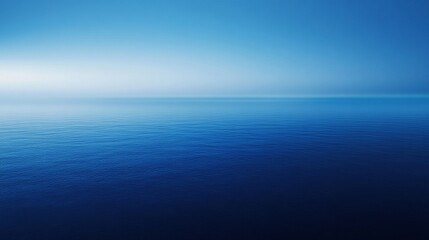 Fototapeta premium A smooth blue gradient background fading from deep navy