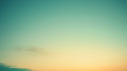 Fototapeta premium A serene sunset sky featuring calming hues of blue and orange, evoking tranquility and peace.