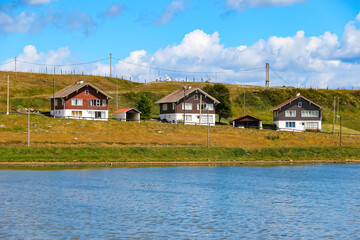 Oceanside wooden houses in Ushuaia, the world's southernmost city in the Tierra del Fuego province...