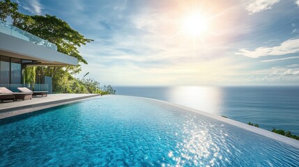 A serene view of an infinity pool overlooking a tranquil ocean at sunset, surrounded by lush greenery.