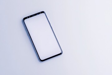 smartphone with blank screen on white background