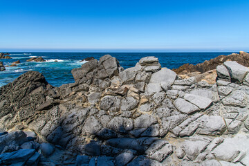 rocks and surf at the seaside