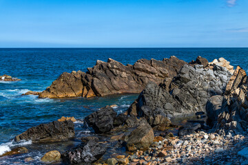 View of the rocks and surf on the sea