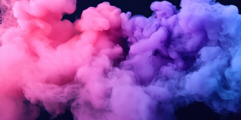 Colorful smoke swirls in the darkness creating an abstract background