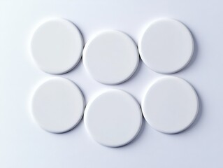 Blank white round badges on white background