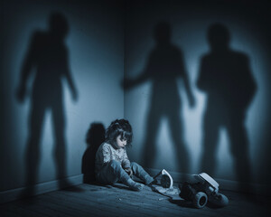 A young child with messy hair sits on the floor, surrounded by the shadows of arguing adults, representing the emotional impact of conflict on children in a family.