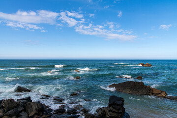 View of the rocks and surf on the sea