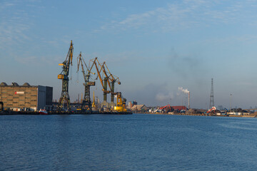 Obraz premium A view of the shipyard cranes in Gdansk