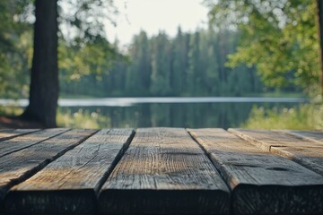 Naklejka premium The empty wooden table top with blur background of summer lakes green forest. High quality photo