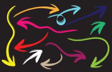 Set of colorful hand drawn grunge doodle spiral and curved chalk arrows on black background. eps10